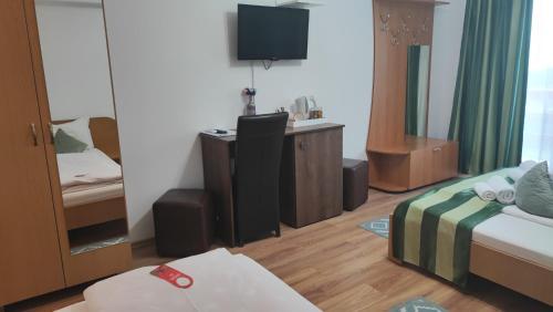 Letto o letti in una camera di MOTEL PRISLOP