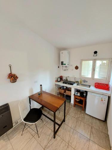 Kuchyň nebo kuchyňský kout v ubytování Rumihuasi Apartamento