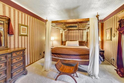 a bedroom with a bed and a dresser at Yankton Apt 1 Mi to Mount Marty University! in Yankton