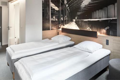 Postel nebo postele na pokoji v ubytování Four Points Flex by Sheraton Aarhus Skejby