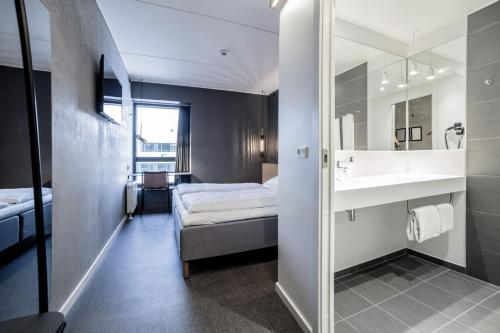 Katil atau katil-katil dalam bilik di Four Points Flex by Sheraton Aarhus Skejby