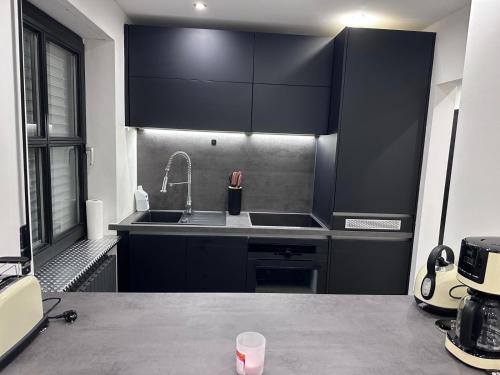 Η κουζίνα ή μικρή κουζίνα στο Wohnung im Herzen von München