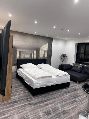 Ένα ή περισσότερα κρεβάτια σε δωμάτιο στο Wohnung im Herzen von München