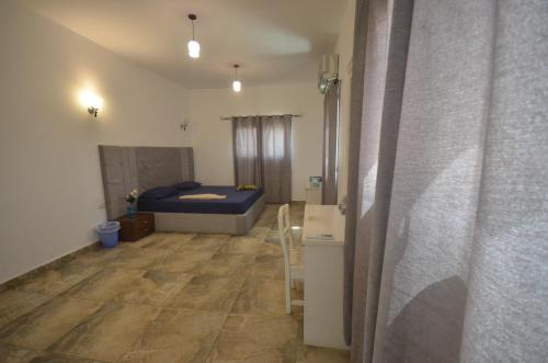 Una cama o camas en una habitación de Elite Residence Dahab