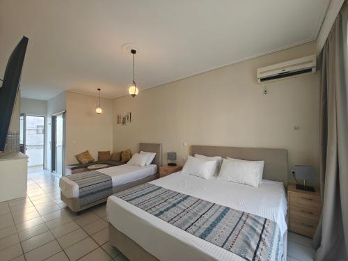 Postel nebo postele na pokoji v ubytování Marina Studio Appartments