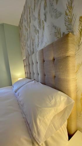Ένα ή περισσότερα κρεβάτια σε δωμάτιο στο Casa Lima - Un apartamento familiar y acogedor