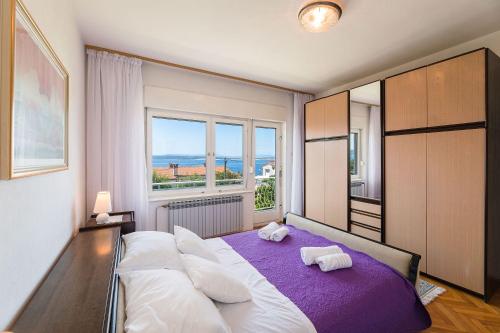 Komfortables Apartment nur 200 Meter zum Sandstrand mit Meerblick, Liegewiese, Grill