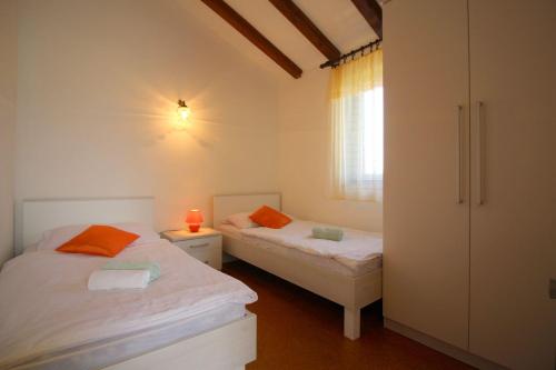 Charmantes Apartment mit privatem Balkon, Privatparkplatz, WiFi und nur 700 Meter zum Strand