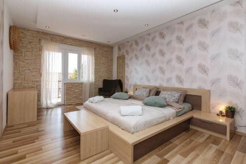 Faszinierendes Ferienhaus nur 500 Meter zum Strand mit Meerblick, Whirlpool, Grill