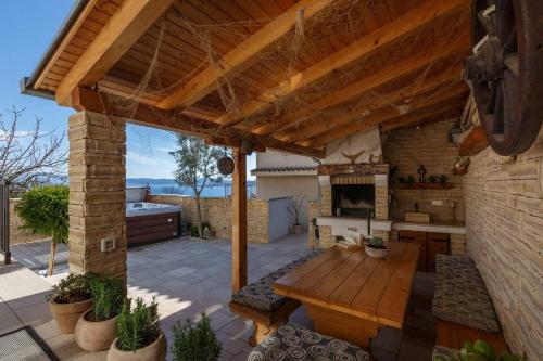 Faszinierendes Ferienhaus nur 500 Meter zum Strand mit Meerblick, Whirlpool, Grill