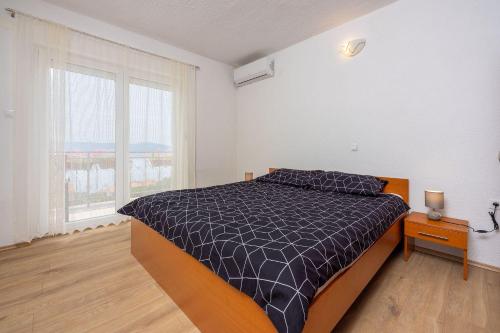 Modernes Apartment nur 300 Meter zum Strand mit Meerblick, Pool, Grill - hundefreundlich