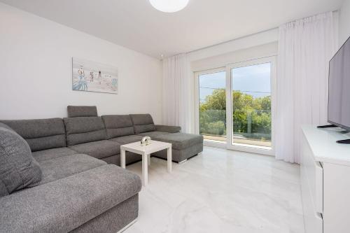 Modernes Apartment direkt am Strand mit Whirlpool, Meerblick, Lounge-Bereich