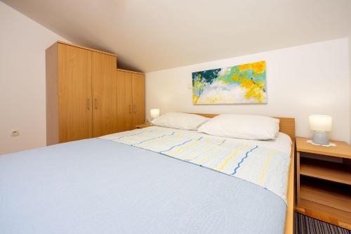 Cozy Dachgeschosswohnung mit Meerblick, Klima, WiFi - nur 350 Meter zum Strand