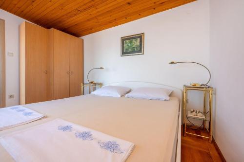Komfortables Apartment nur 250 Meter zum Sandstrand mit privater Dachterrasse und Meerblick