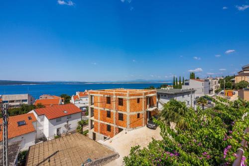 Komfortables Apartment nur 250 Meter zum Sandstrand mit privater Dachterrasse und Meerblick