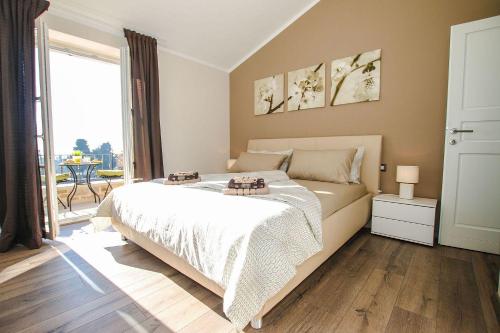 Ένα ή περισσότερα κρεβάτια σε δωμάτιο στο Atemberaubende Finca mit Bikes, Salzwasserpool, Meerblick, Spielplatz, Lounge-Bereich