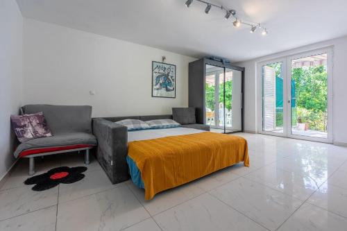 Beeindruckendes Apartment direkt am Strand mit privater Terrasse, Privatparkplatz, WiFi, Grill