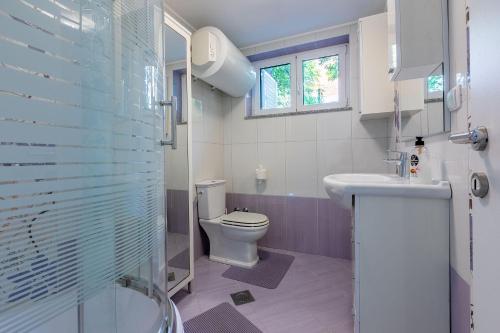 Beeindruckendes Apartment direkt am Strand mit privater Terrasse, Privatparkplatz, WiFi, Grill