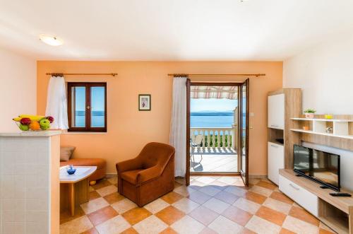 Helles Apartment mit traumhaften Meerblick, Grill und nur 500 Meter zum Strand