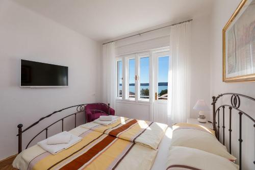 Einzigartiges Apartment nur 100 Meter zum Sandstrand mit grosser Dachterrasse, Meerblick, Waschmaschine