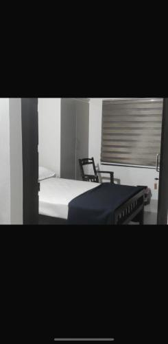 Postel nebo postele na pokoji v ubytování Mankombil Heritage Inn