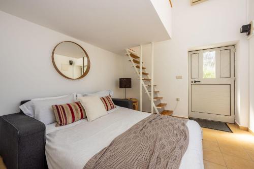 Cozy Apartment nur 350 Meter zum Sandstrand mit privater Terrasse und mediterranem Garten