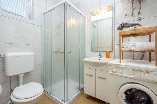 Cozy Apartment nur 350 Meter zum Sandstrand mit privater Terrasse und mediterranem Garten