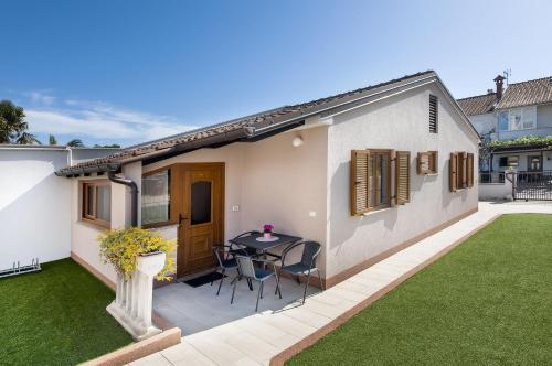 Cozy Apartment nur 600 Meter zum Strand mit Grill, privater Terrasse, Waschmaschine