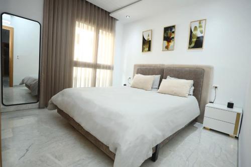 Postel nebo postele na pokoji v ubytování Sea & city house