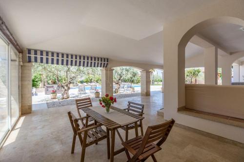 Lauschiges Apartment mit 60m2 Pool, Babybett, Waschmaschine, Grillbereich - nur 800 Meter zum Strand