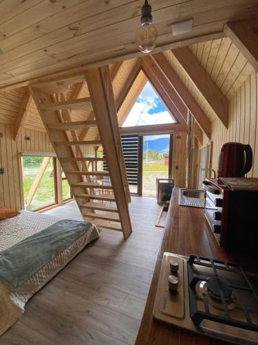 Ένα ή περισσότερα κρεβάτια σε δωμάτιο στο Cabañas ruka