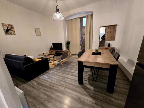 Posezení v ubytování Appartement 2 chambres, cuisine équipée