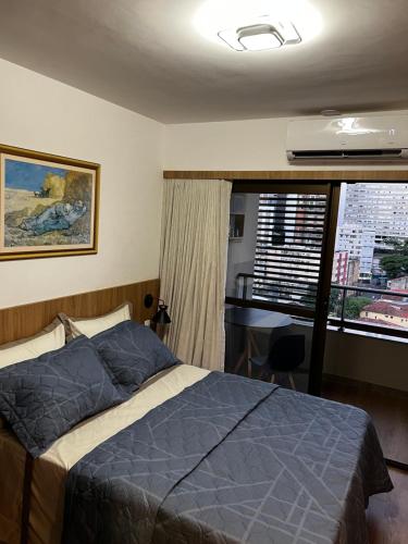 Cama o camas de una habitación en Turismo & Business ! Piscina com vista mar, rooftop, academia e praia