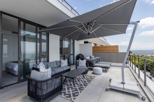 Χώρος καθιστικού στο Plett Quarter Apartments