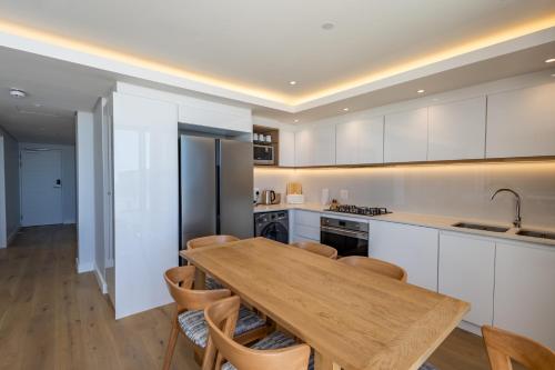 Η κουζίνα ή μικρή κουζίνα στο Plett Quarter Apartments