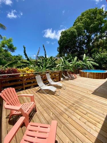 Φωτογραφία από το άλμπουμ του Ti family nature gite studio location de vacances Guadeloupe - Bas de villa - Piscine partagée σε Sainte-Anne