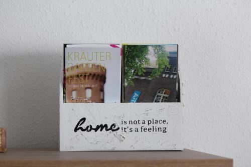 a book sitting on top of a table at Ferienwohnung In Bedburg Hau in Bedburg Hau