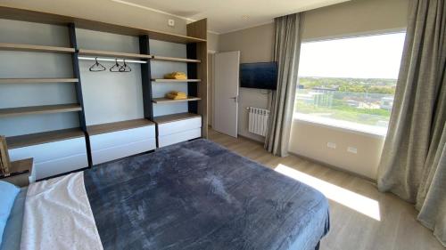 Ένα ή περισσότερα κρεβάτια σε δωμάτιο στο CASA LAS OLAS Quequen