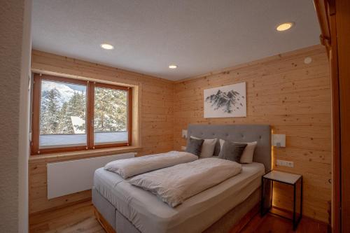 Posteľ alebo postele v izbe v ubytovaní Schickster Sky Lodge
