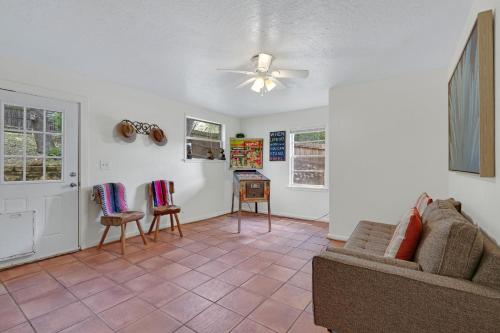 a living room with a couch and chairs at Mi Rancho in Wimberley