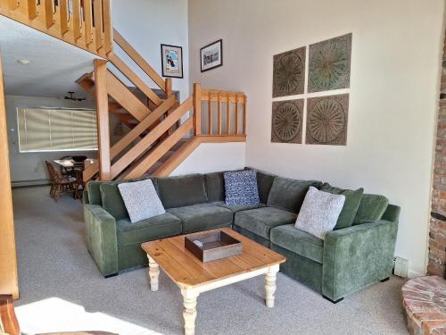 a living room with a couch and a coffee table at The Wentworth in Jackson