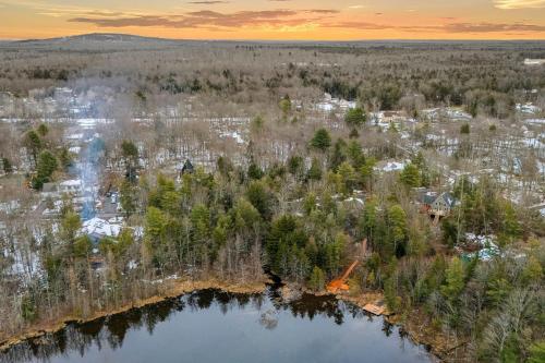 an aerial view of a lake with trees and houses at Lakeview Sunset Heaven Waterfront Escape Private Dock Firepit Game Room New Construction in Blakeslee