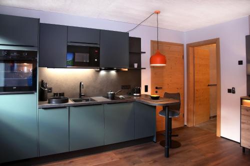Kuchyň nebo kuchyňský kout v ubytování Landhaus Rieser
