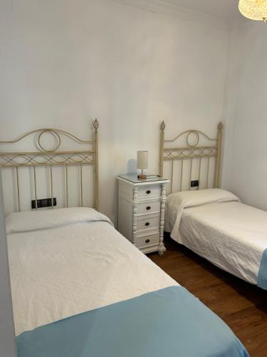 Ένα ή περισσότερα κρεβάτια σε δωμάτιο στο Apartamento Gerena 5B bajo