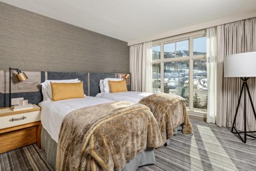 Postel nebo postele na pokoji v ubytování Viceroy Snowmass