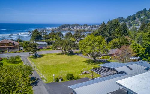 an aerial view of a house with a park at The Boat House in Yachats
