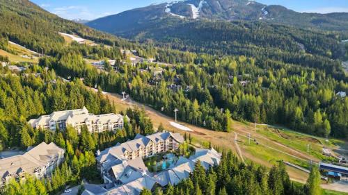 an aerial view of a resort in the mountains at Aspens by WB Vacation Rentals in Whistler