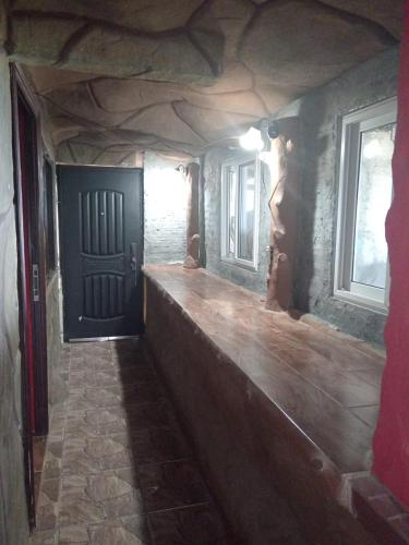 a room with a wooden counter and a door at Cabana 5 Estrellas in Chicá