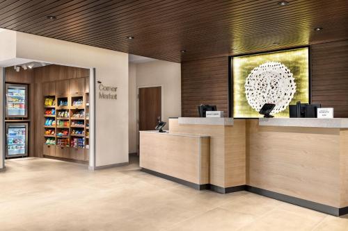 a lobby of a store with a reception counter at Fairfield by Marriott Inn & Suites Bethlehem PA in Bethlehem