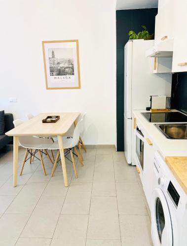 Kuchyň nebo kuchyňský kout v ubytování Apartment Rosario in Malaga center